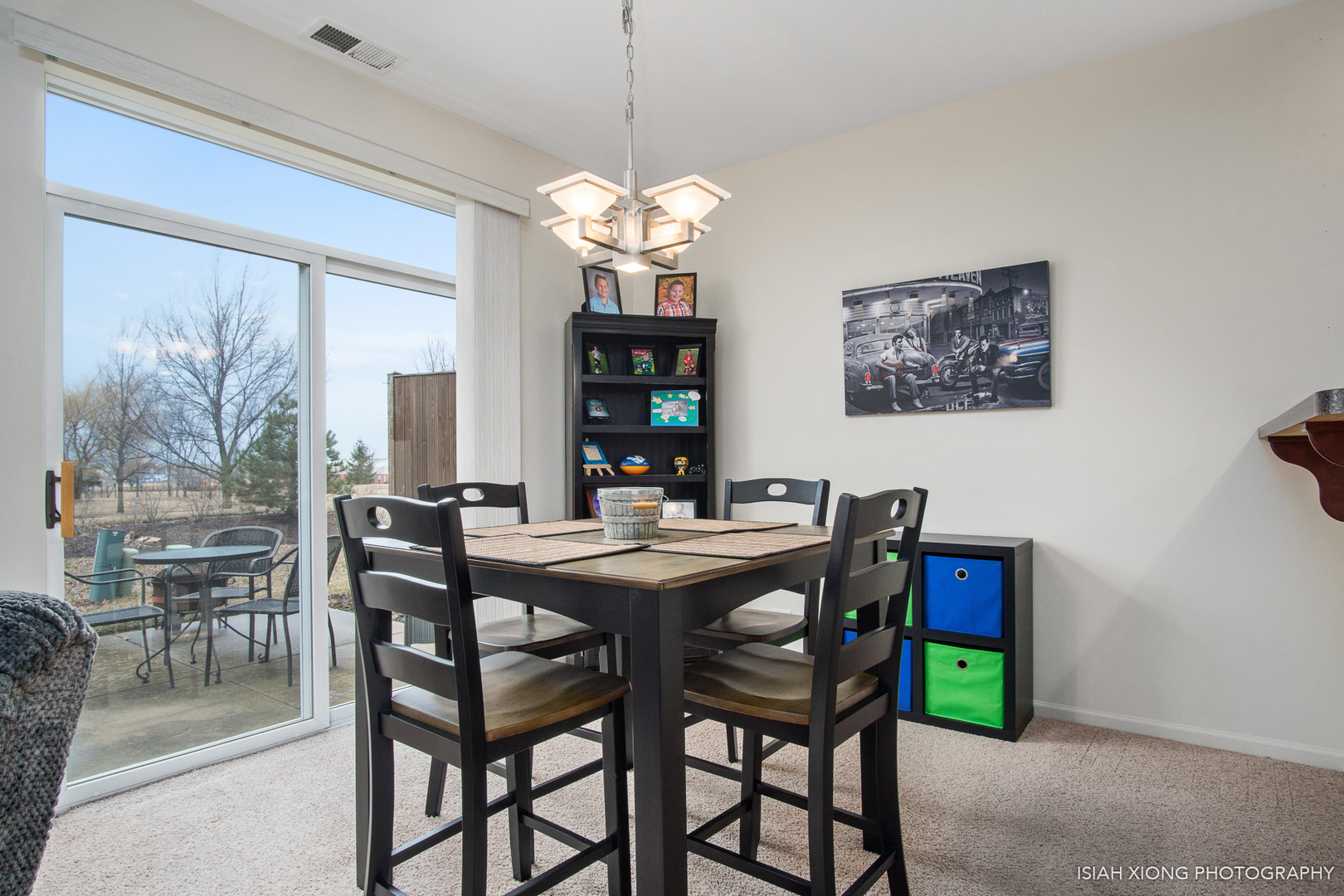 445 Dancer Lane, Unit 405 Oswego, IL 60543 - Photo 4 of 32 a view of a dining room with furniture window and outside view