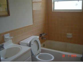 2430 Lisa Melbourne, FL 32935 - Photo 7 of 11 a bathroom with a sink and bathtub