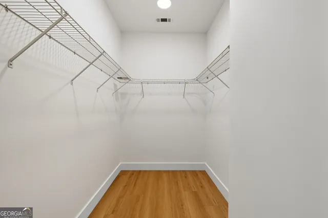 a view of a room with racks on the wall