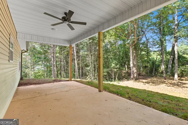 a view of a backyard with garden