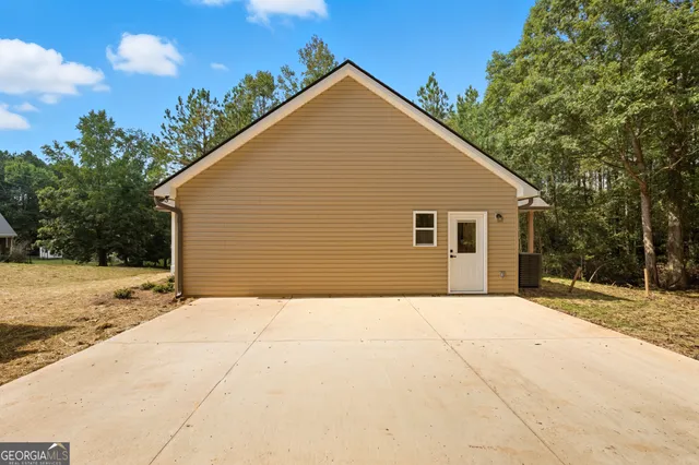 a view of backyard of house