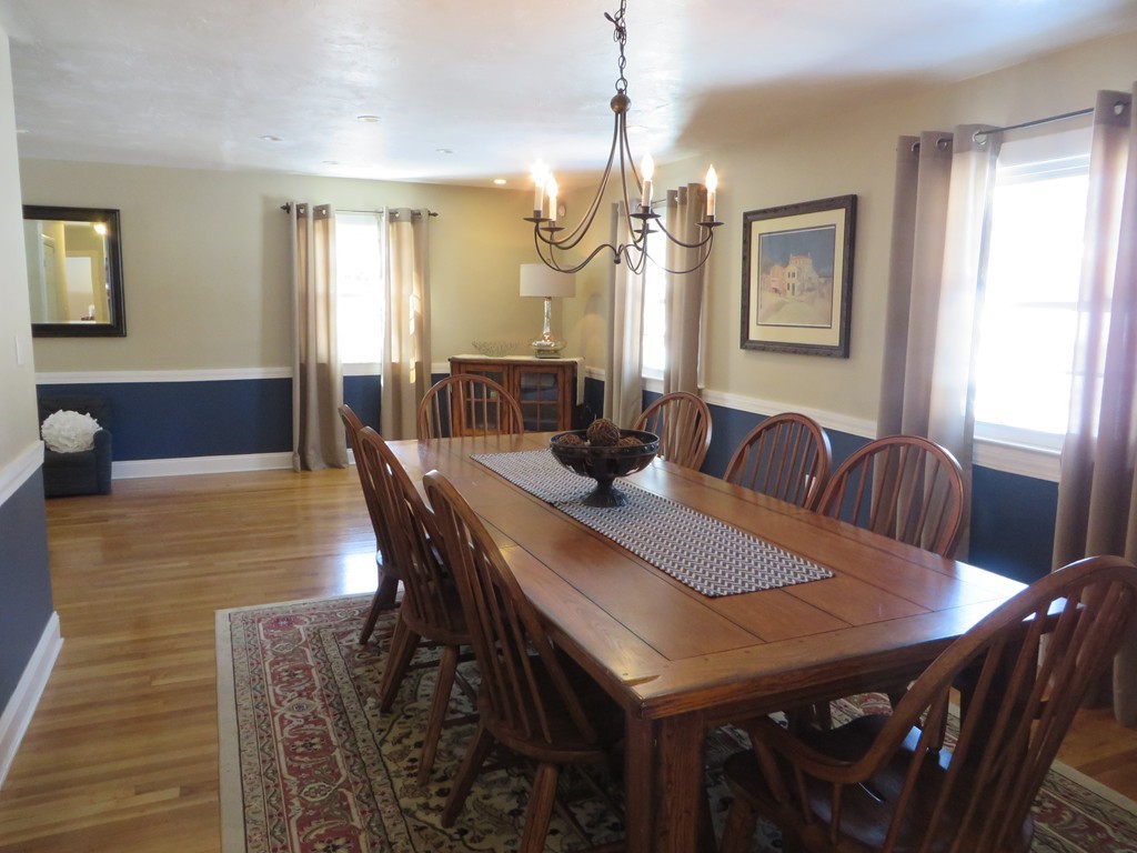 6 Davis Road Chelmsford, MA 01824 - Photo 10 of 21 a view of a a dining room with furniture window and wooden floor