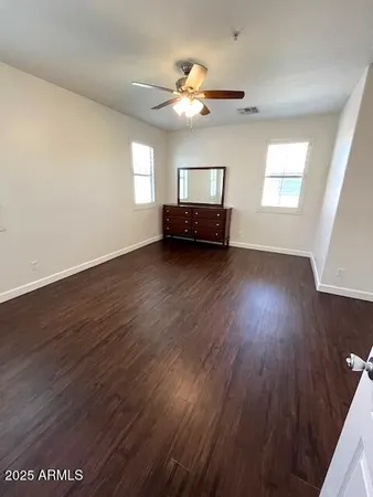 a view of livingroom with hardwood floor and hallway