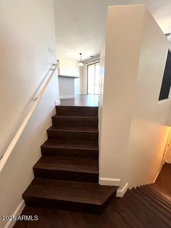 a view of entryway with wooden floor