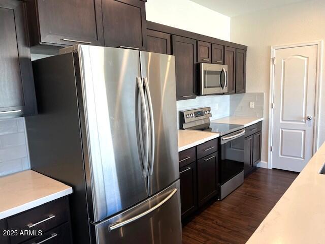 1255 South Rialto, Unit 164 Mesa, AZ 85209 - Photo 6 of 26 a kitchen with stainless steel appliances a refrigerator sink and microwave