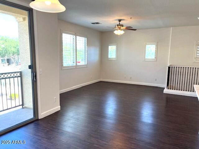 1255 South Rialto, Unit 164 Mesa, AZ 85209 - Photo 8 of 26 an empty room with wooden floor and windows