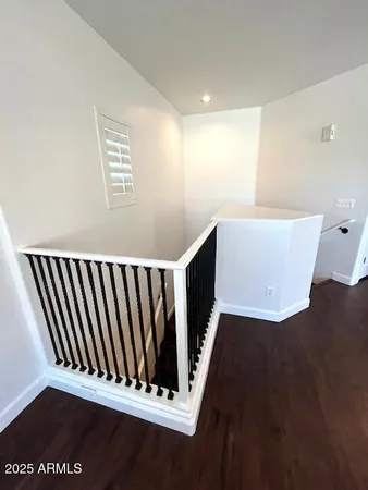 a view of wooden floor and staircase