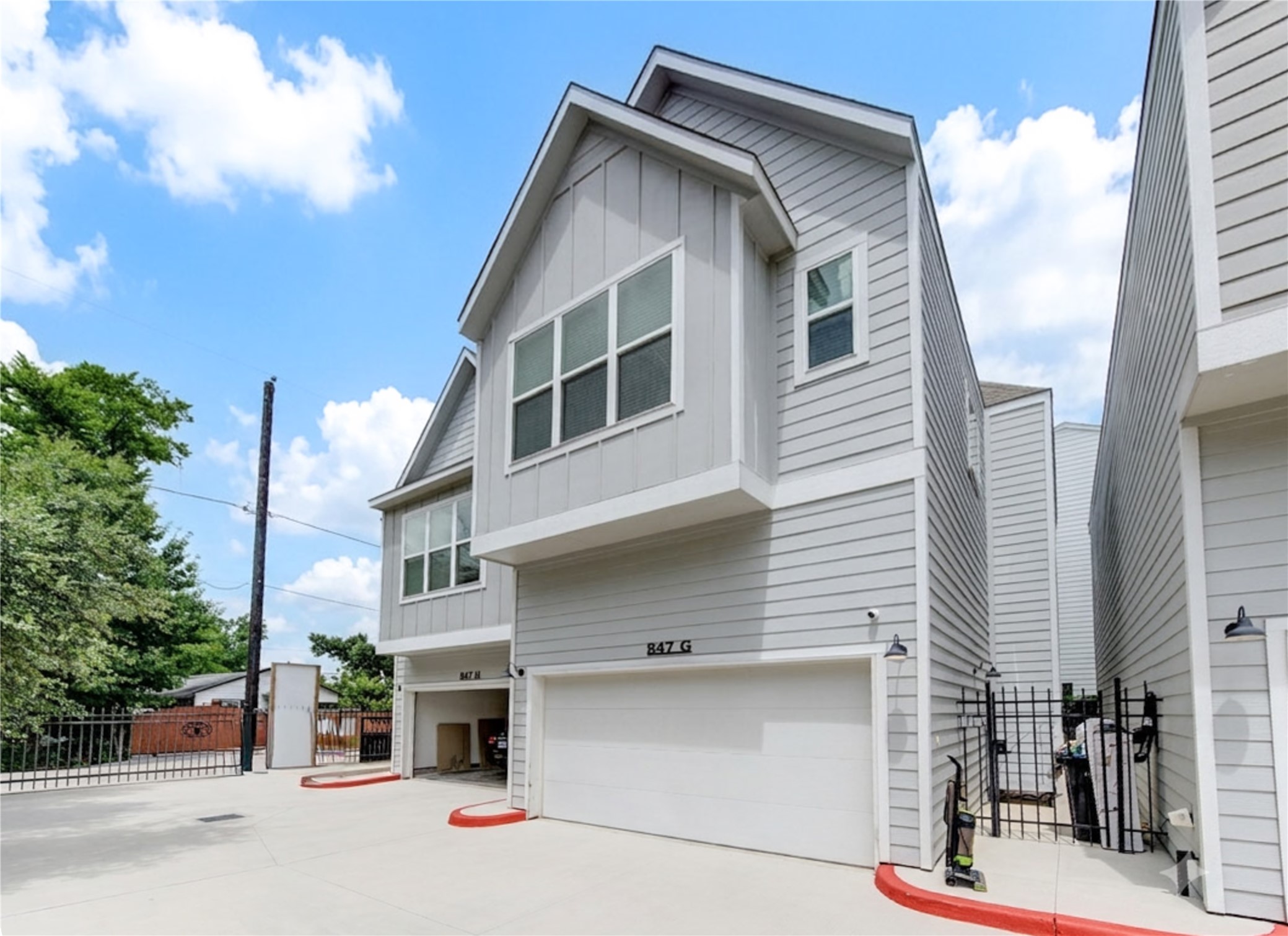 847 Rachel Street, Unit G Houston, TX 77091 - Photo 41 of 42 Stunning modern contemporary façade featuring sleek design and impressive curb appeal.