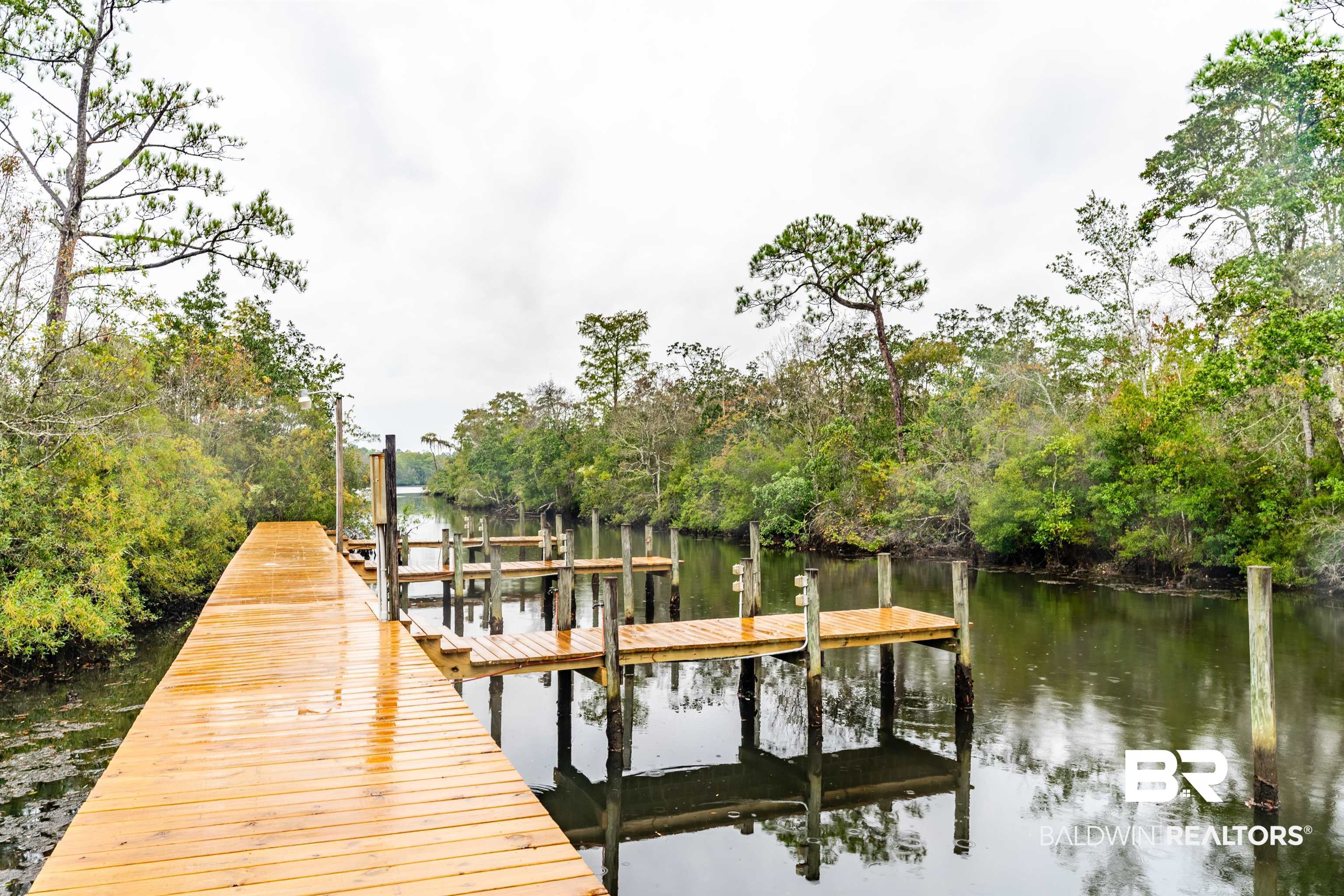 4055 Riviere Du Chien Road Mobile, AL 36693 - Photo 58 of 63 Dock area featuring a water view