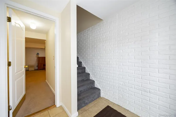 a view of a bathroom from the hallway