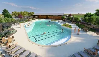 a view of a swimming pool with a yard