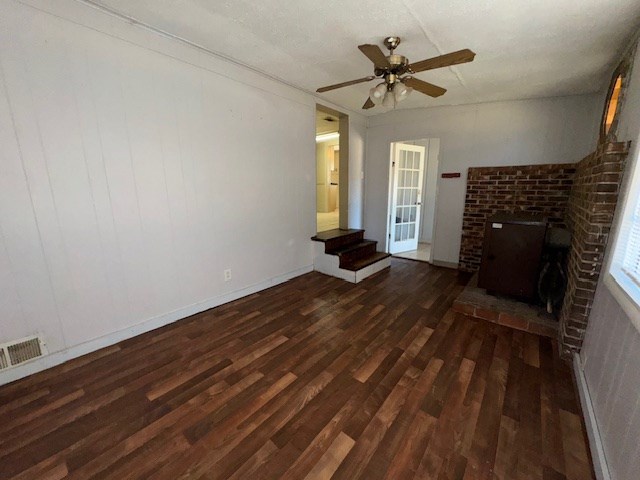 1542 Pineknot Road Box Springs, GA 31801 - Photo 12 of 18 Den has a closet and Woodburning stove