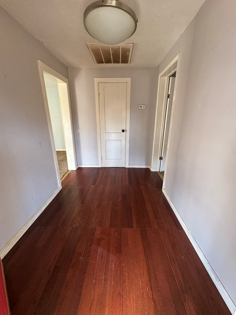 1542 Pineknot Road Box Springs, GA 31801 - Photo 2 of 18 Entry Hallway w/Hardwood Floors