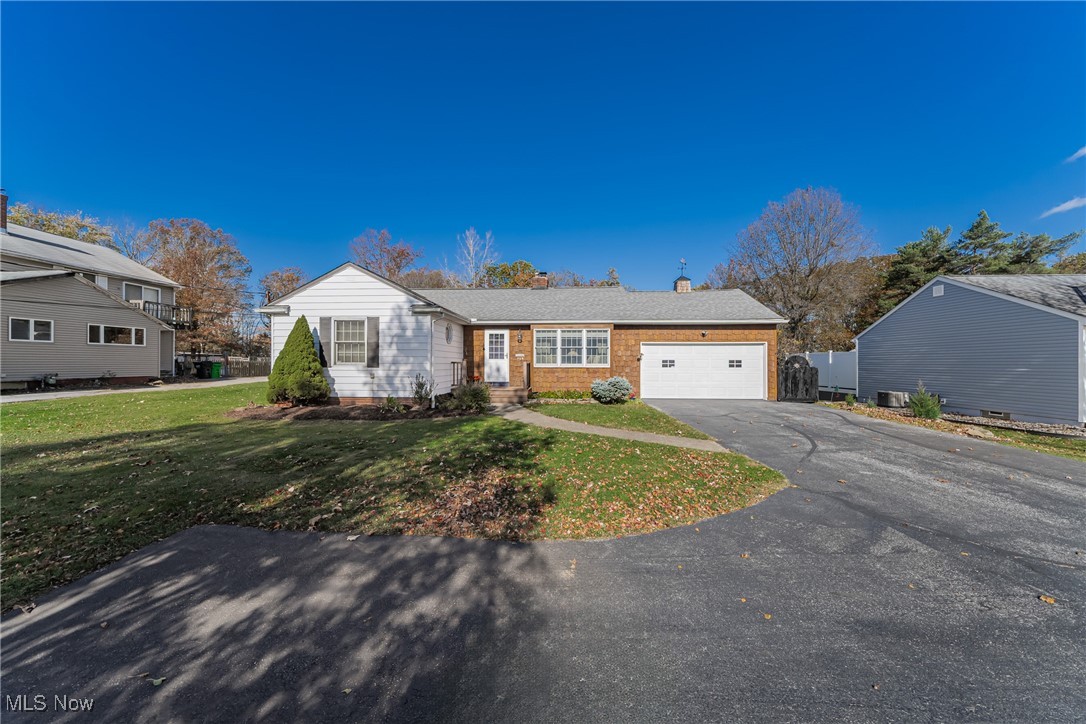 6287 Highland Road Cleveland, OH 44143 - Photo 2 of 46 Single story home with a garage and a front yard