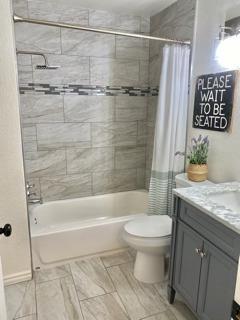 72 Rancho Drive, Unit D San Jose, CA 95111 - Photo 10 of 19 a bathroom with a toilet and a shower