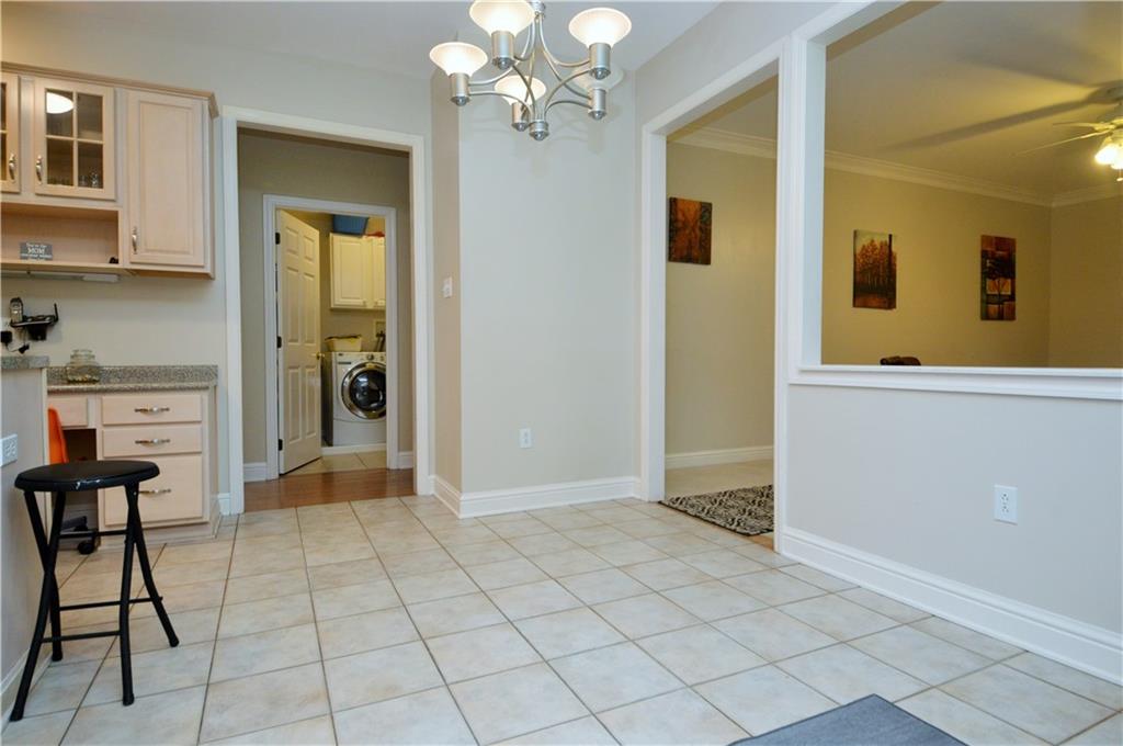 1300 Sara Court Coraopolis, PA 15108 - Photo 13 of 50 a view of a livingroom with a dinning table and chairs