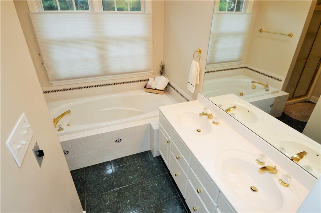 1300 Sara Court Coraopolis, PA 15108 - Photo 24 of 50 a view of bathroom with a sink and mirror