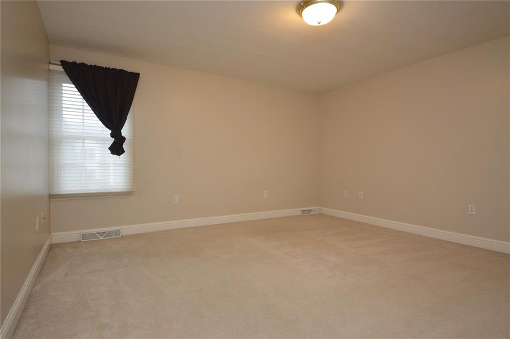 1300 Sara Court Coraopolis, PA 15108 - Photo 26 of 50 an empty room with windows and entrance