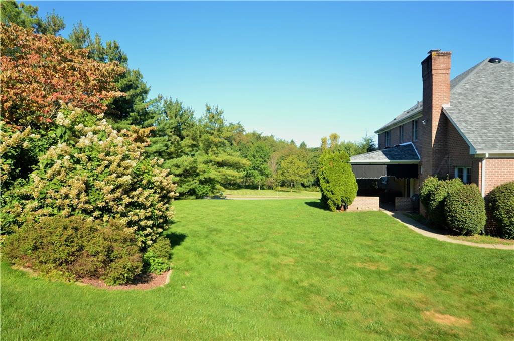 1300 Sara Court Coraopolis, PA 15108 - Photo 3 of 50 a view of a house with a backyard