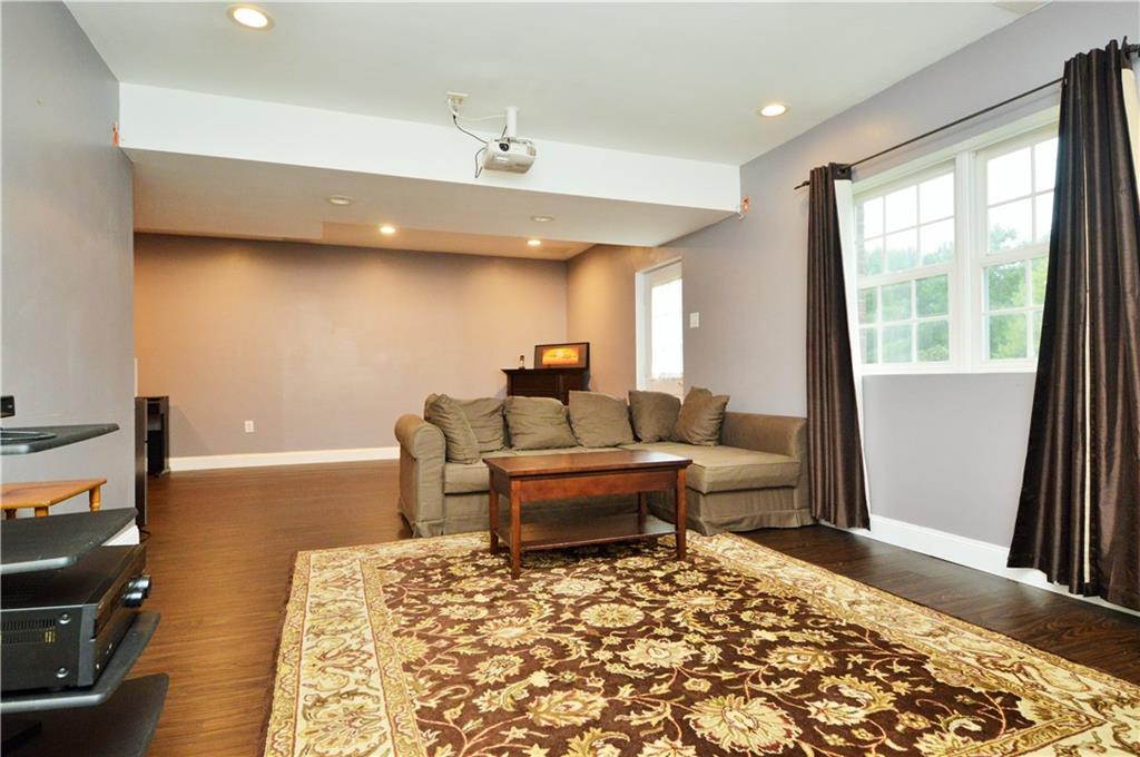 1300 Sara Court Coraopolis, PA 15108 - Photo 34 of 50 a living room with a couch and wooden floor