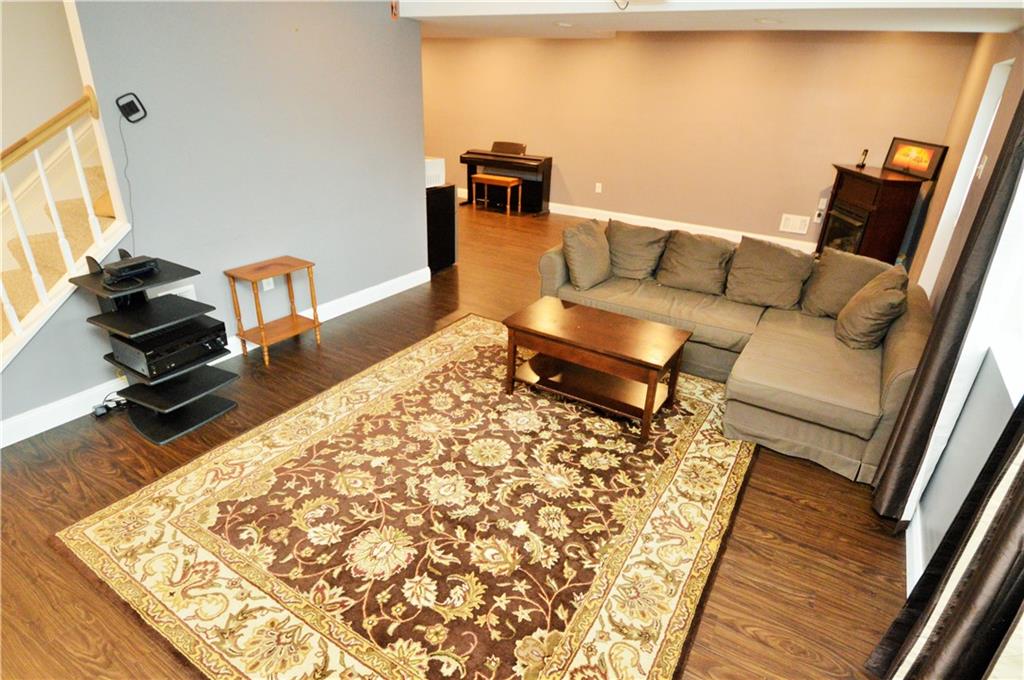 1300 Sara Court Coraopolis, PA 15108 - Photo 35 of 50 a living room with a couch and a rug