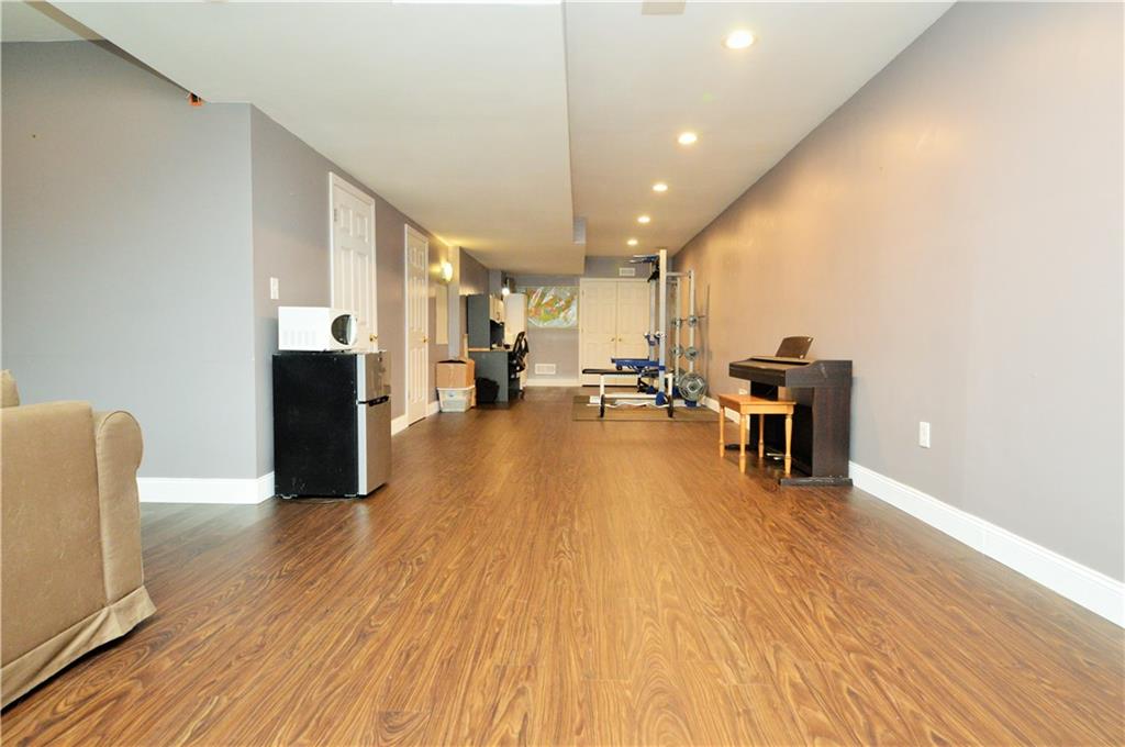 1300 Sara Court Coraopolis, PA 15108 - Photo 37 of 50 a living room with furniture and a wooden floor