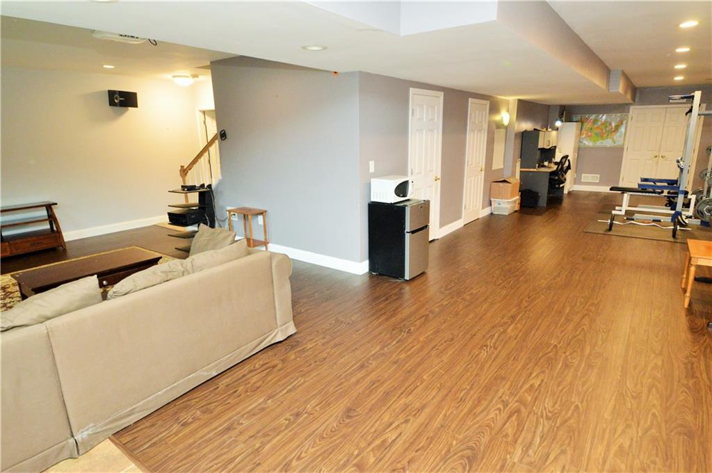 1300 Sara Court Coraopolis, PA 15108 - Photo 38 of 50 a living room with furniture and a wooden floor