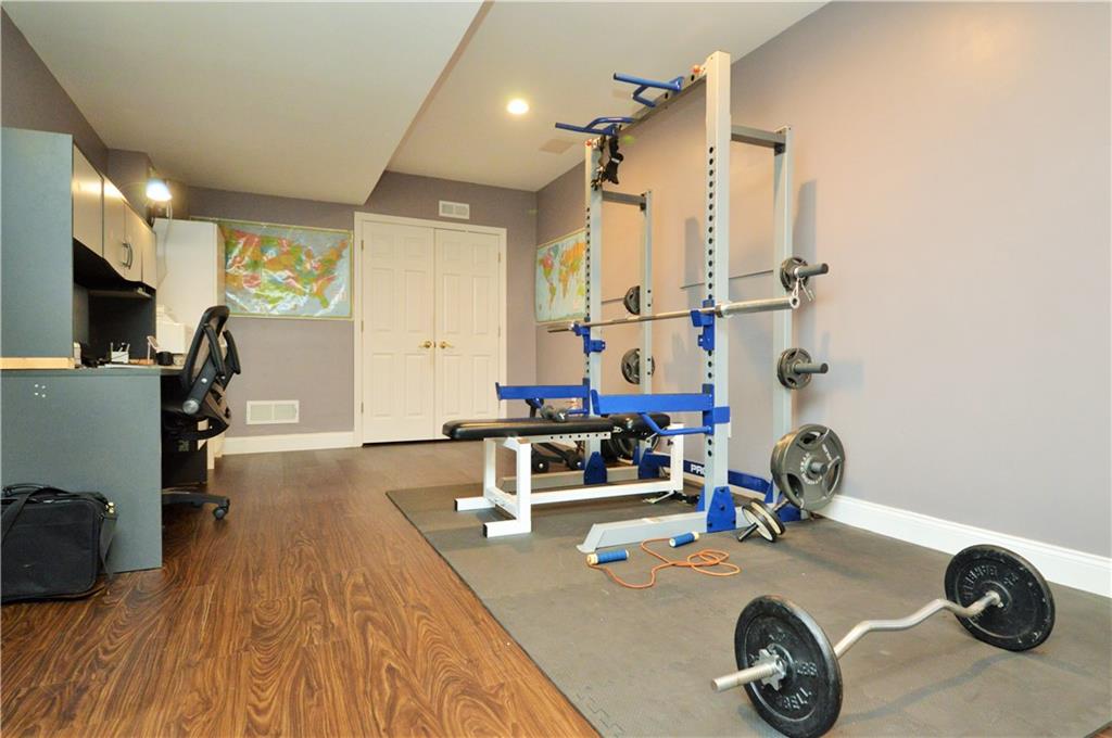 1300 Sara Court Coraopolis, PA 15108 - Photo 39 of 50 a dining room with a table and chairs