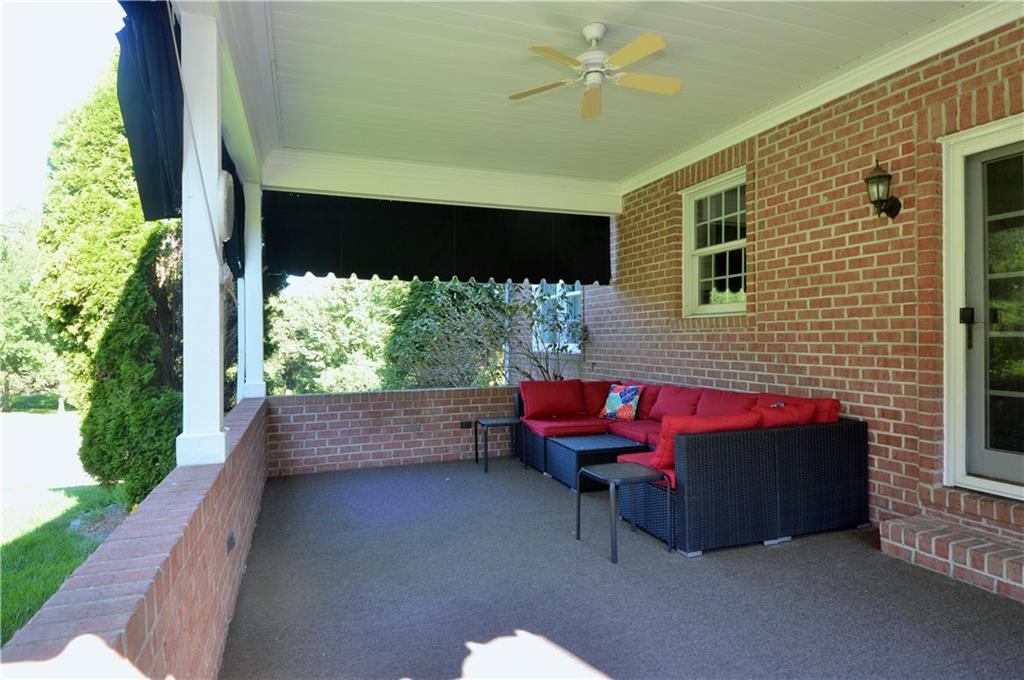 1300 Sara Court Coraopolis, PA 15108 - Photo 4 of 50 a view of a patio with a table and chairs