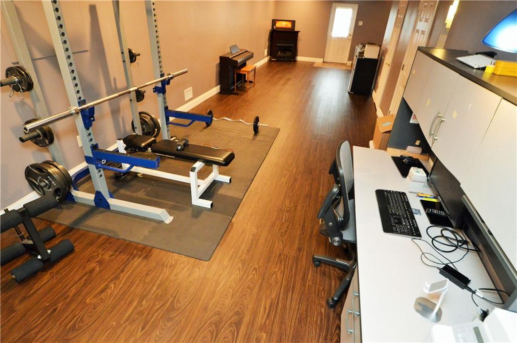 1300 Sara Court Coraopolis, PA 15108 - Photo 41 of 50 a view of a room with wooden floor and windows
