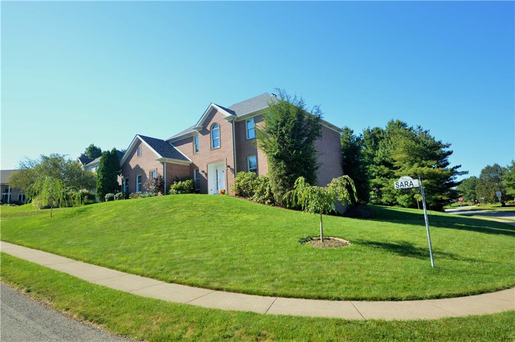 1300 Sara Court Coraopolis, PA 15108 - Photo 47 of 50 a view of a house with a big yard and potted plants