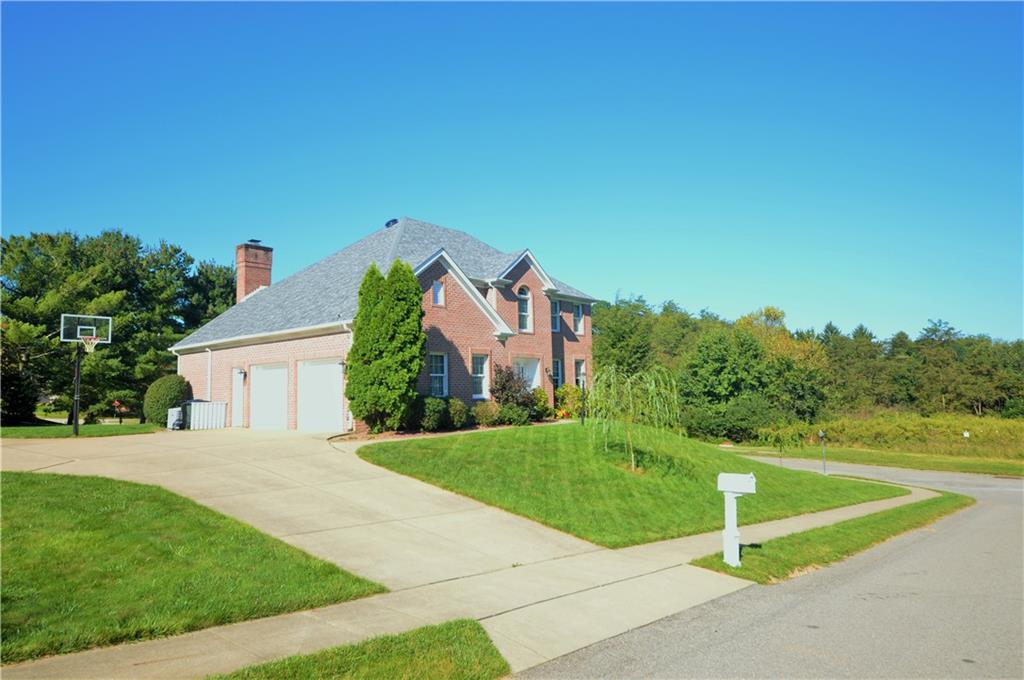 1300 Sara Court Coraopolis, PA 15108 - Photo 48 of 50 a view of a house with a yard and a palm tree
