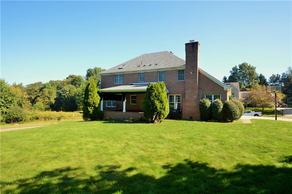 1300 Sara Court Coraopolis, PA 15108 - Photo 49 of 50 a view of a house with a backyard