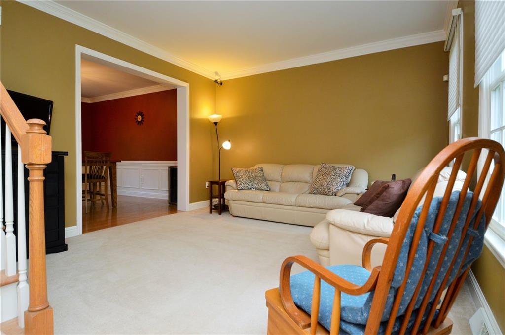 1300 Sara Court Coraopolis, PA 15108 - Photo 7 of 50 a living room with a couch and a walk in closet