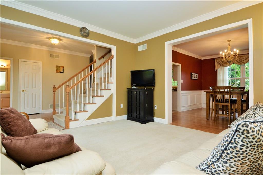 1300 Sara Court Coraopolis, PA 15108 - Photo 8 of 50 a living room with furniture and a flat screen tv