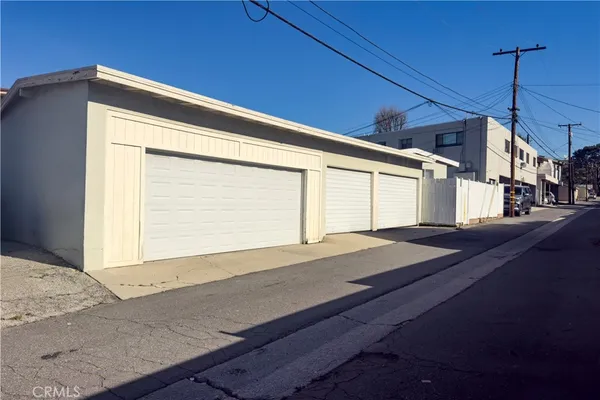 a front view of a house with a garage