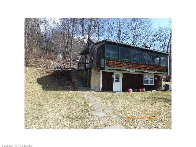 269 South Kent Road Kent, CT 06785 - Photo 1 of 1 a kitchen with a stove and a microwave
