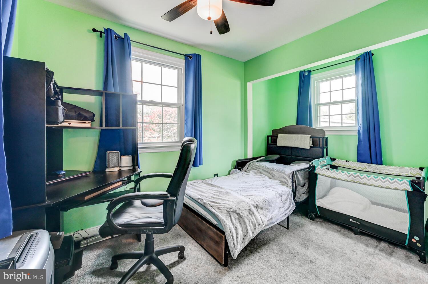 2636 Spring Road Baltimore, MD 21234 - Photo 12 of 25 a bedroom with a bed chair and a window