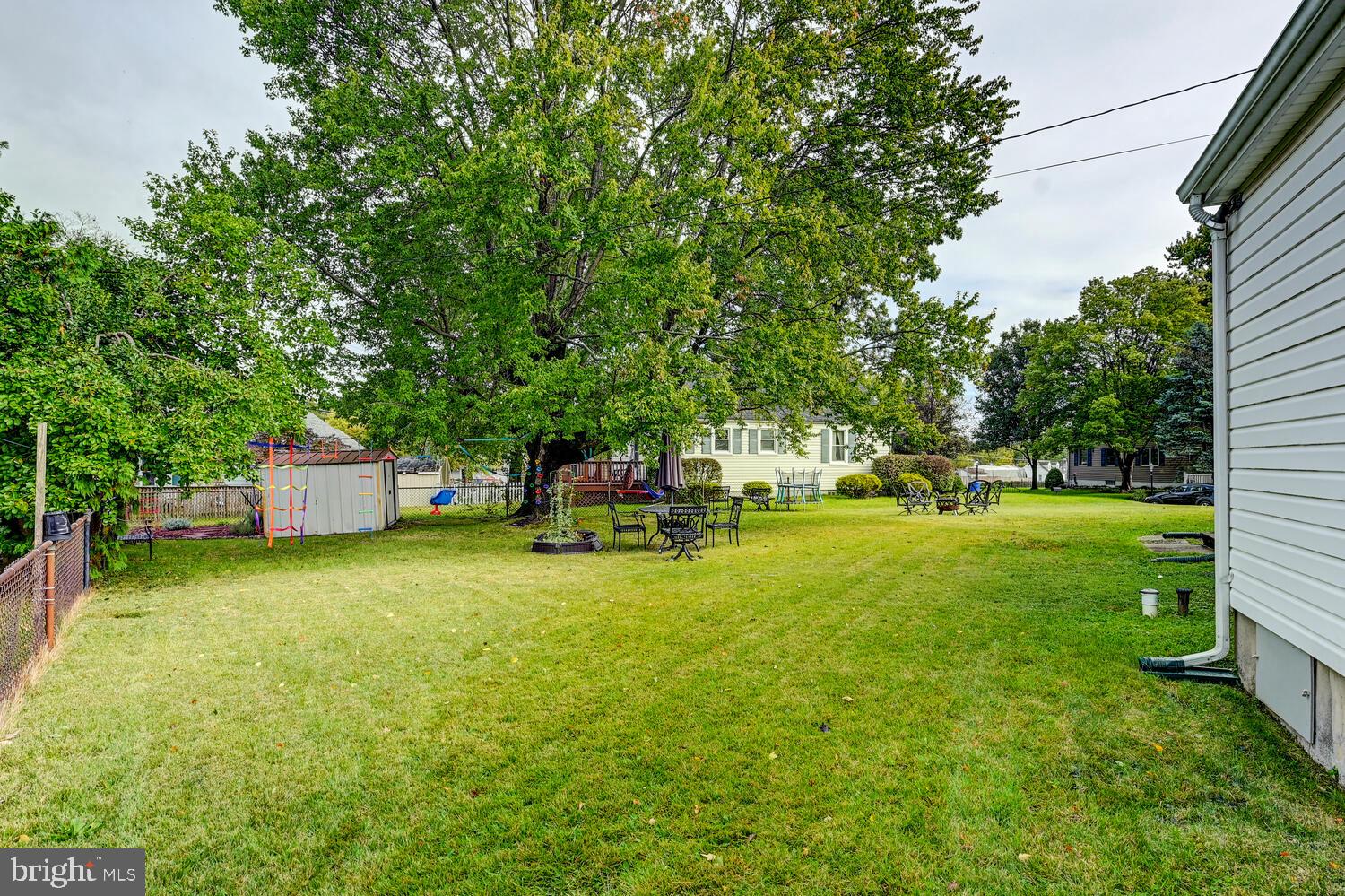 2636 Spring Road Baltimore, MD 21234 - Photo 21 of 25 a swimming pool with some trees in the background
