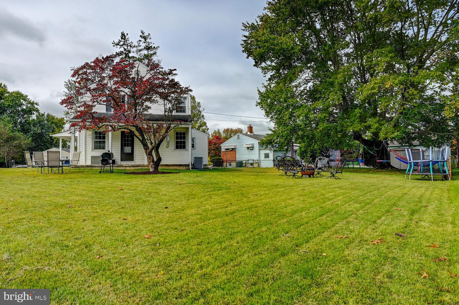 2636 Spring Road Baltimore, MD 21234 - Photo 23 of 25 a view of a house with a big yard