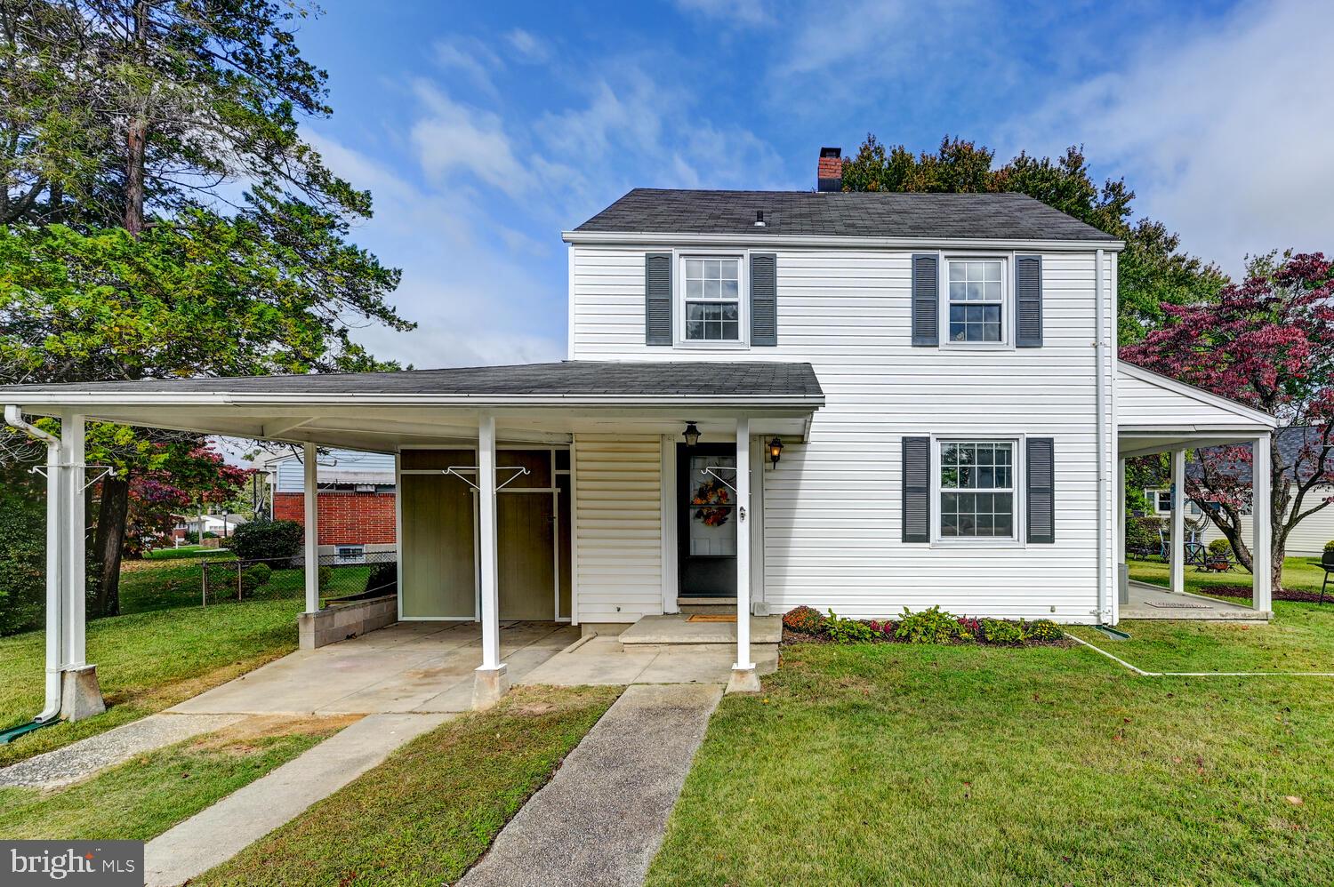 2636 Spring Road Baltimore, MD 21234 - Photo 3 of 25 a front view of a house with a yard