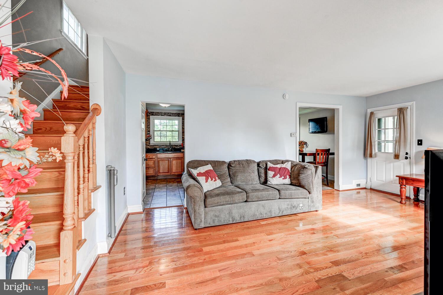 2636 Spring Road Baltimore, MD 21234 - Photo 4 of 25 a living room with furniture and a wooden floor