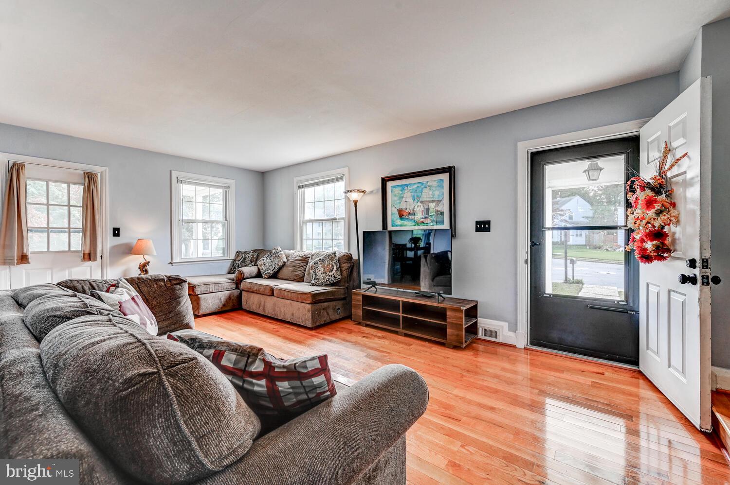2636 Spring Road Baltimore, MD 21234 - Photo 5 of 25 a living room with furniture window and a wooden floor