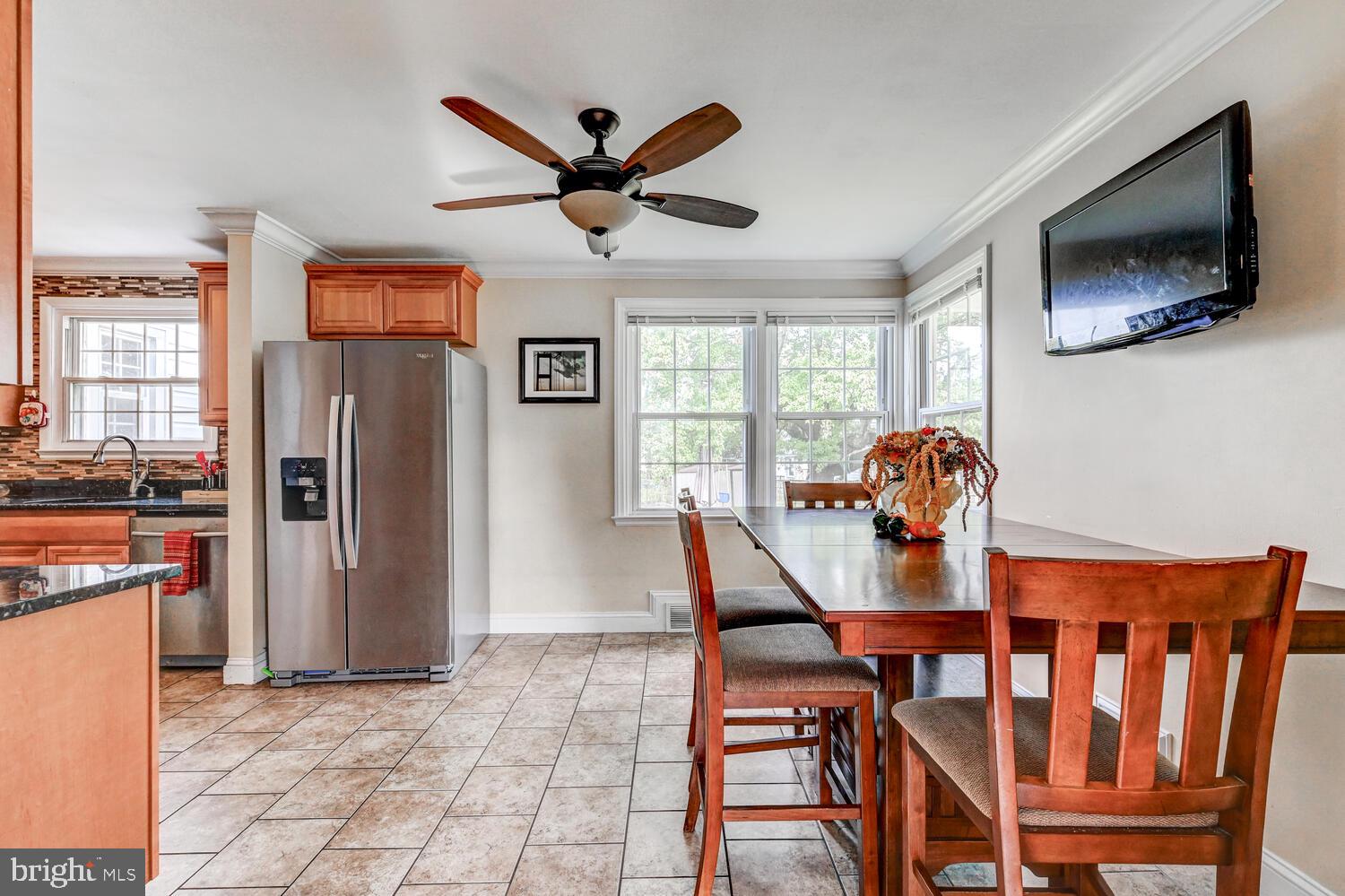 2636 Spring Road Baltimore, MD 21234 - Photo 7 of 25 a view of a dining room with furniture window and wooden floor