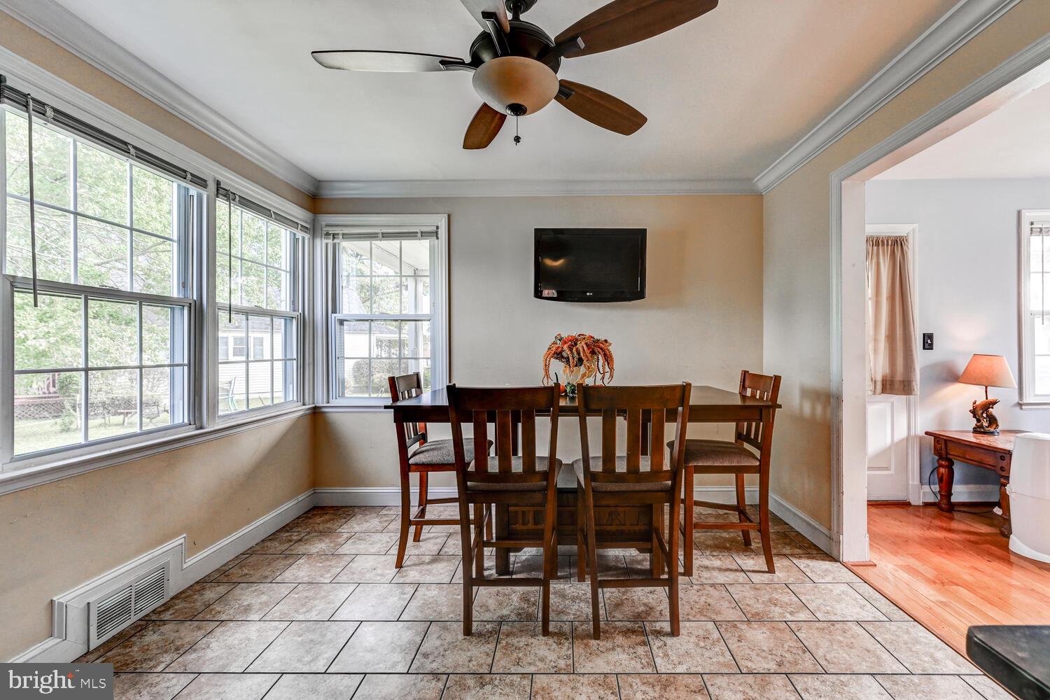 2636 Spring Road Baltimore, MD 21234 - Photo 8 of 25 a view of a dining room with furniture window and outside view