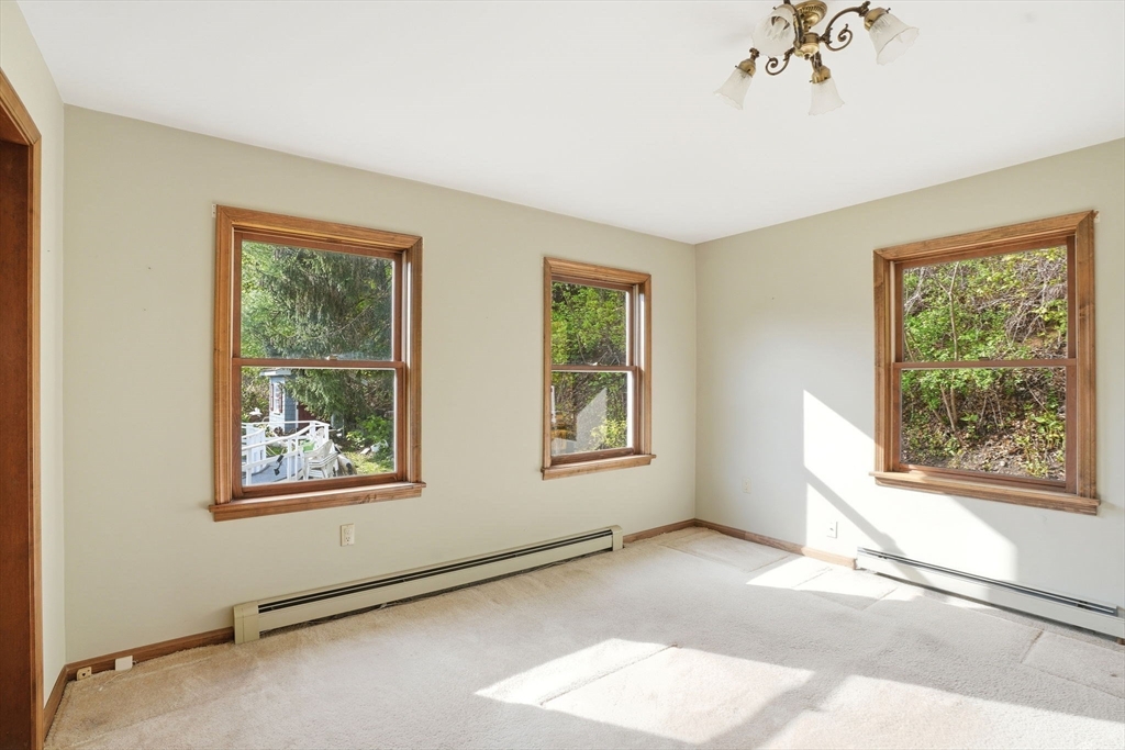 67 Wituwamat Road Weymouth, MA 02191 - Photo 19 of 42 a view of an empty room with a window