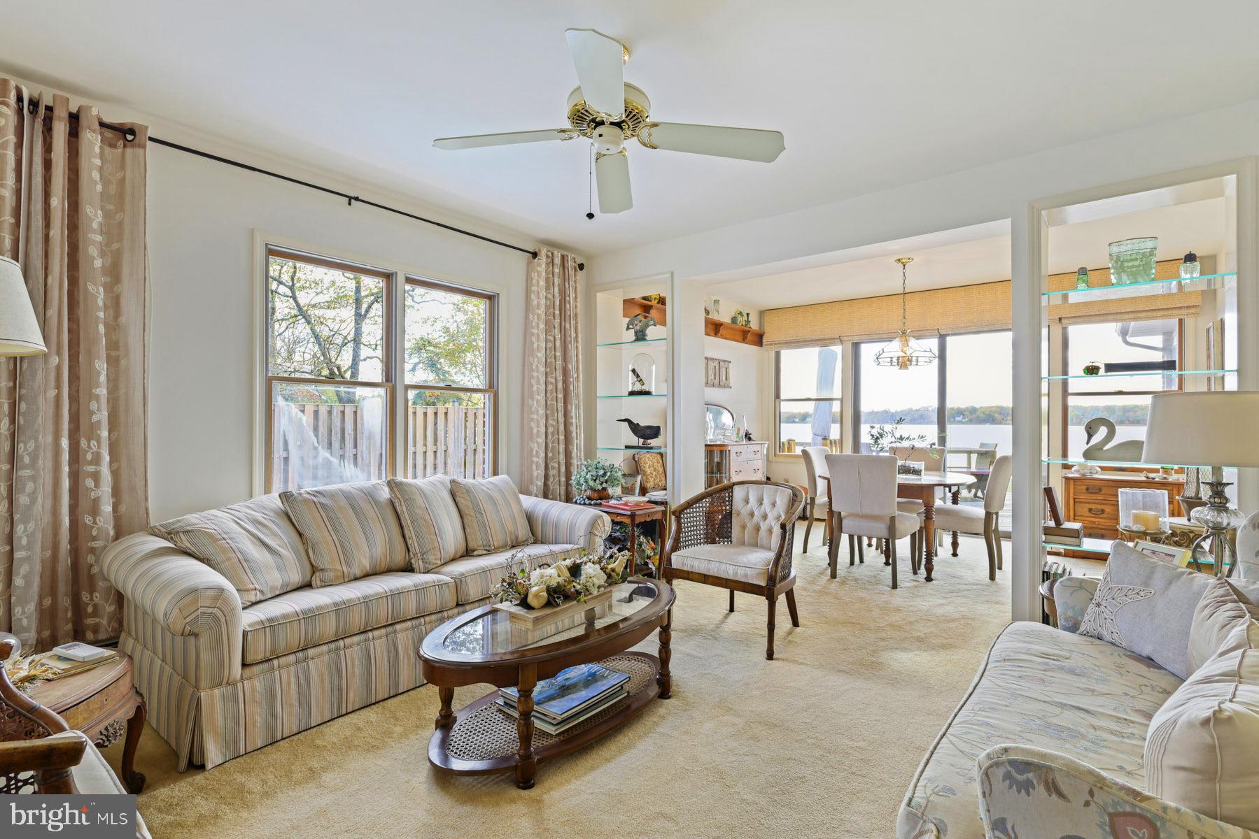 3258 Harness Creek Road Annapolis, MD 21403 - Photo 16 of 34 a living room with furniture and a large window