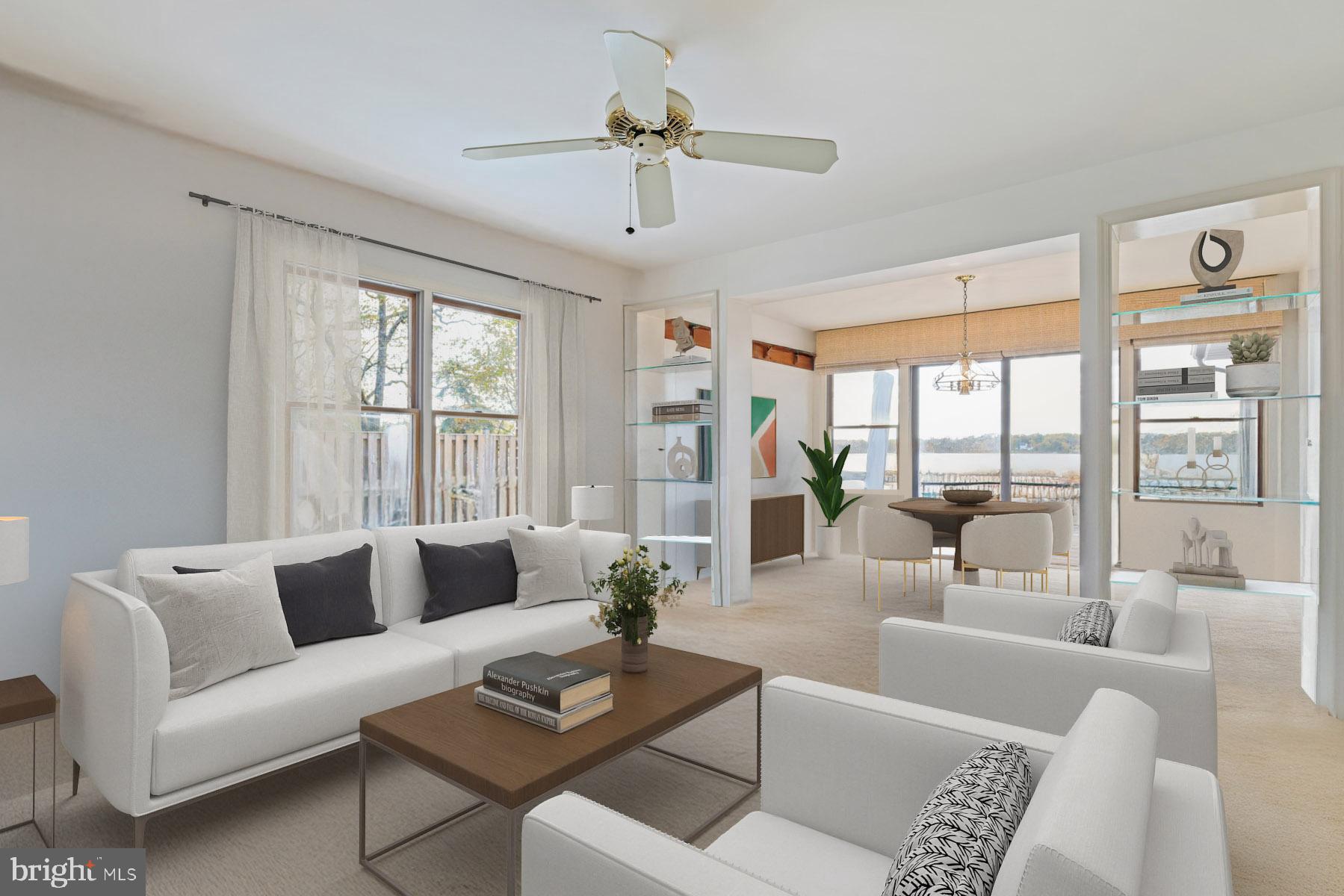 3258 Harness Creek Road Annapolis, MD 21403 - Photo 17 of 34 a living room with furniture and large windows