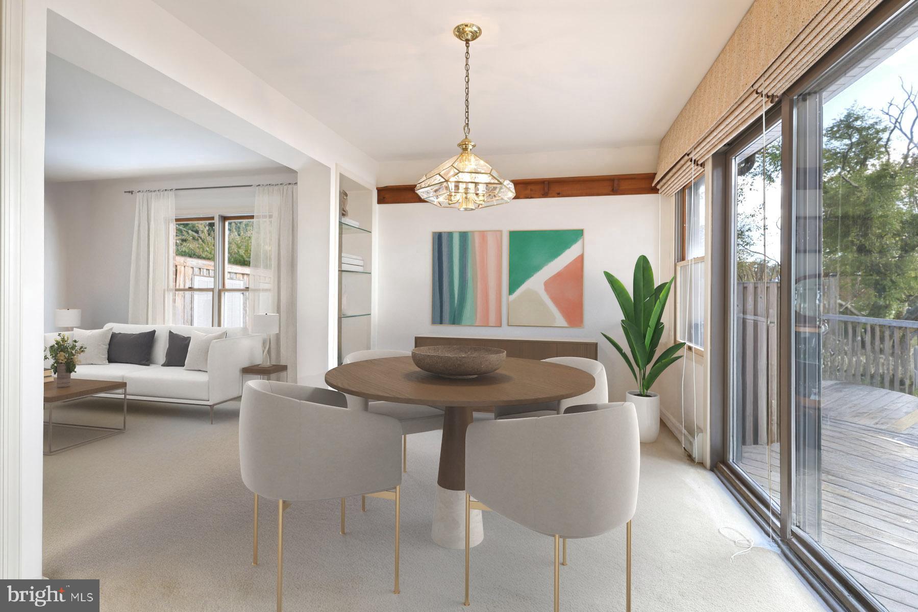 3258 Harness Creek Road Annapolis, MD 21403 - Photo 22 of 34 a dining room with furniture a chandelier and wooden floor