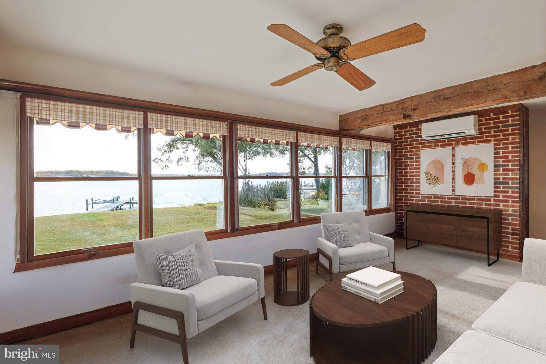 3258 Harness Creek Road Annapolis, MD 21403 - Photo 28 of 34 a living room with furniture and a large window